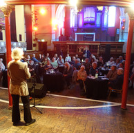 Woman reads to audience