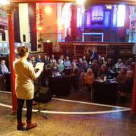 Woman reading to audience