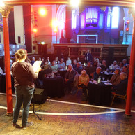 Woman reads to audience