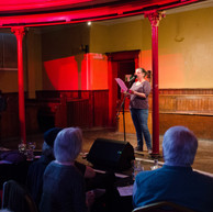 Woman reads to audience