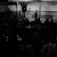 Man reads to audience
