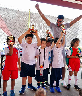 kids-celebrating-birthday-party-football