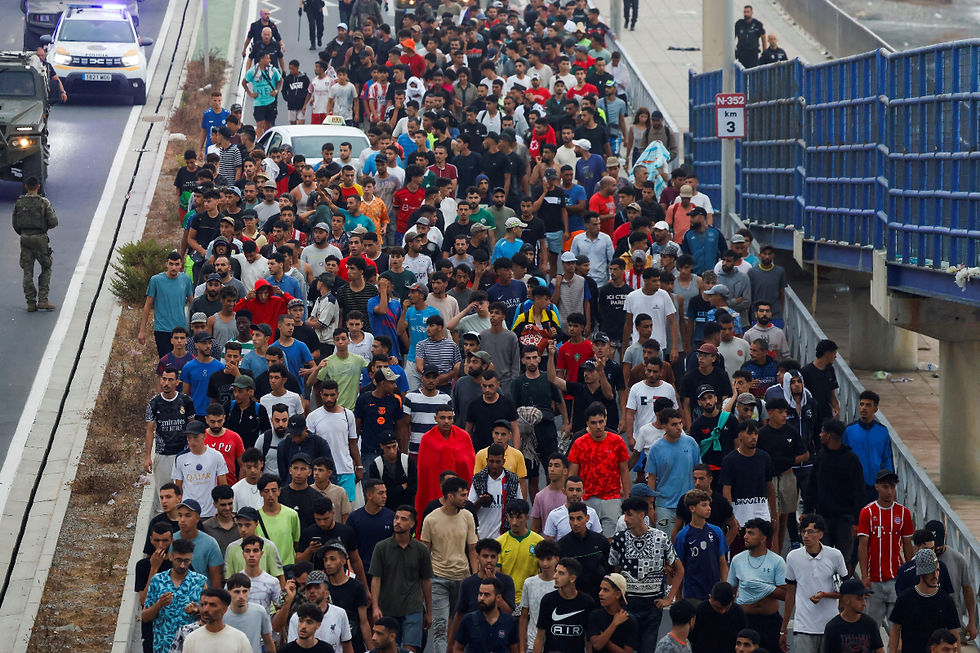Spain says migrants are returning to Morocco after 57 die in border rush