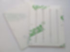 A photo of the plastic panels delivered from the laser cutting service. They have their protective film attached.