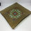 Thumbnail: Bronze glass square dish with a puzzle centre