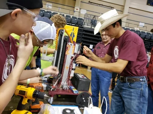 Campers at one of SAME’s Engineering & Construction Camps assemble an electronics project. (Photo Credit: Society for American Military Engineers)