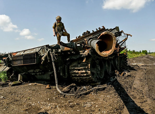 russian casualties in ukraine, destroyed tank, soldier