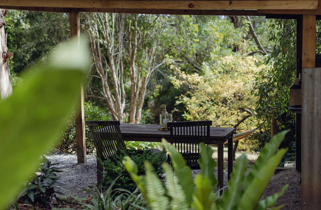 Covered dining table at your private BBQ area