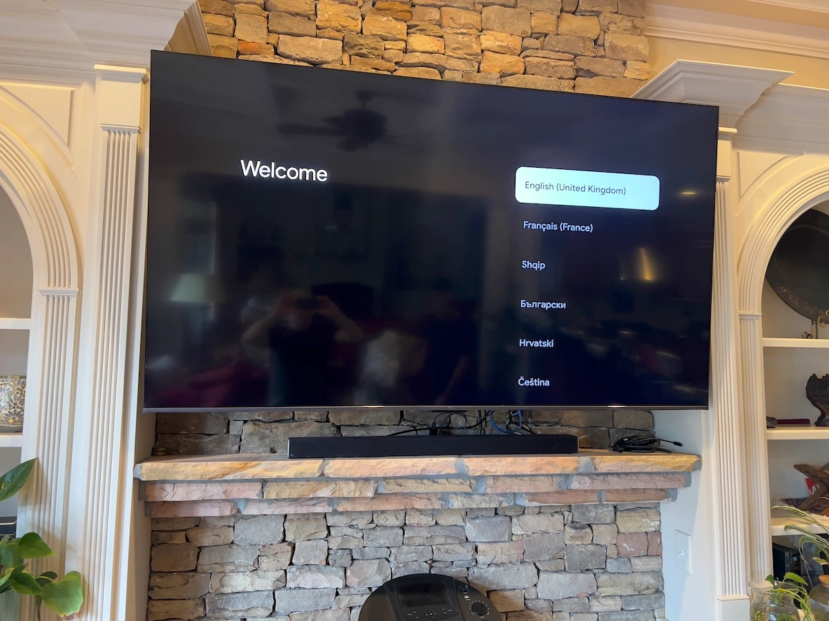 85 Sony TV mounted above a fireplace in Smyrna, GA