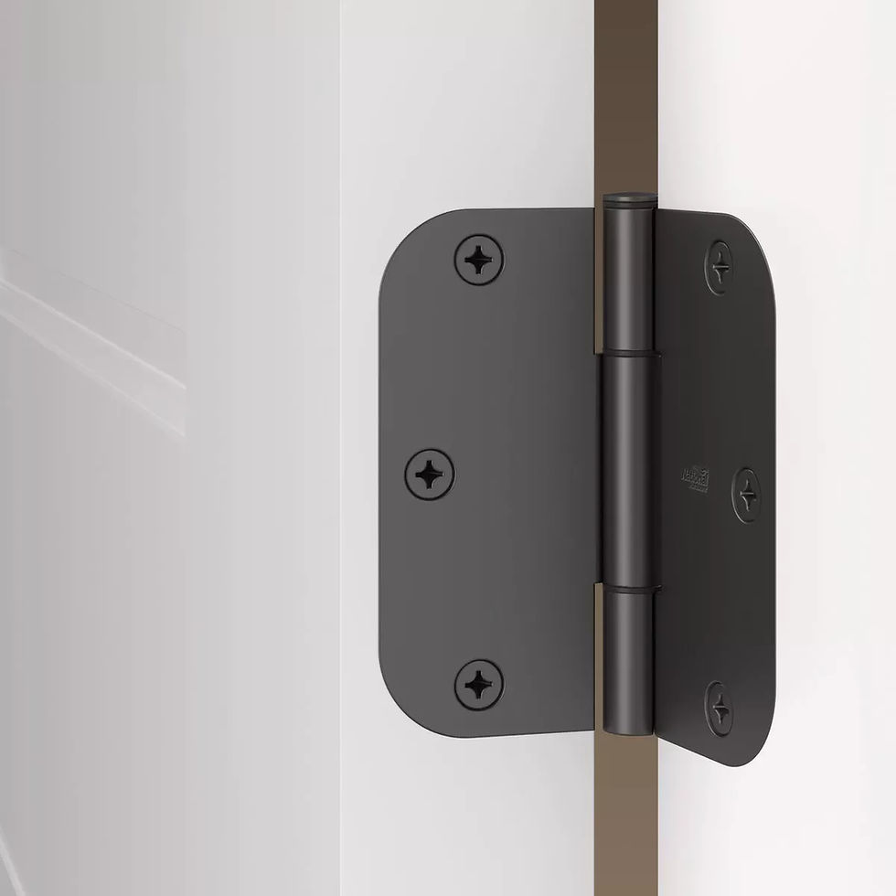 A black matte hinge is seamlessly installed on a white door, showcasing a sleek and modern design.