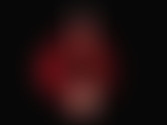 Red decorative bottle surrounded by swirling red smoke on black background. Visible text: Blanco. Bold and dramatic mood.