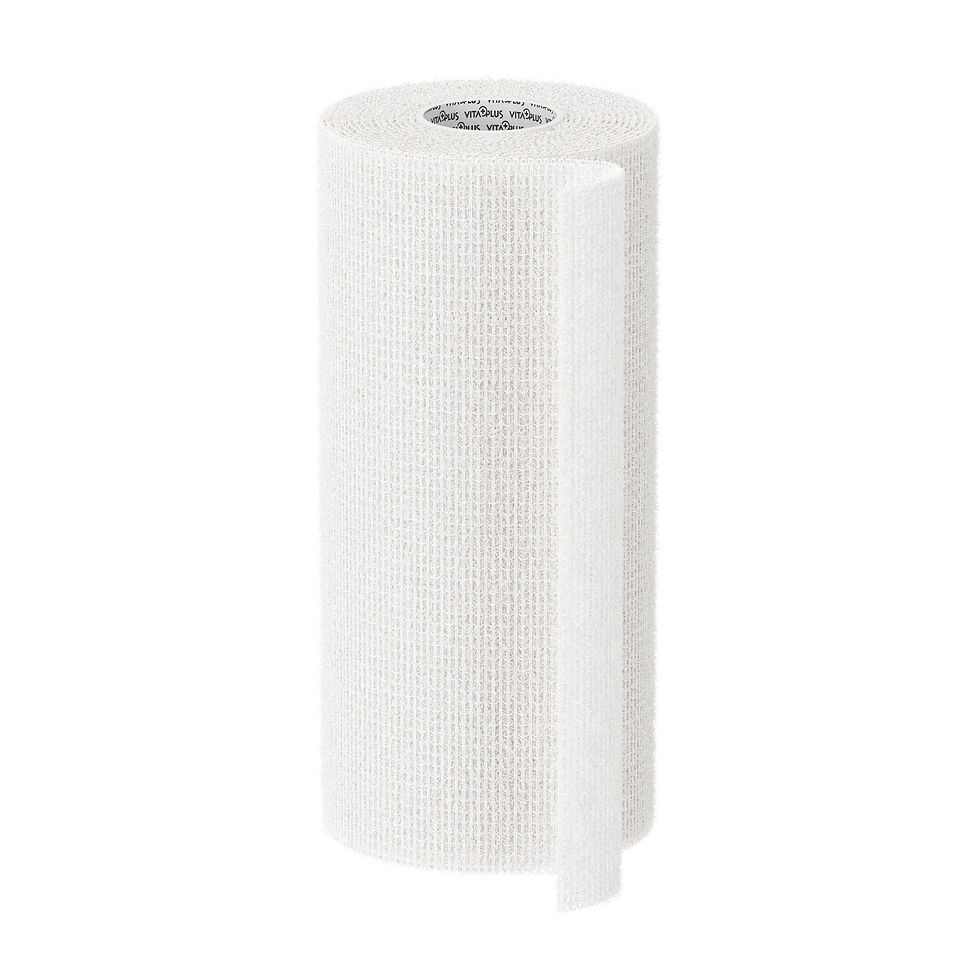 A white medical bandage roll with textured surface on white background. A small section is unrolled. Inner label text partially visible.