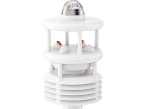 White weather sensor with cylindrical design and multiple tiers, featuring a clear dome on top. Background is plain white.