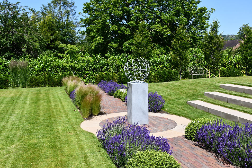 Brick path and sculpture