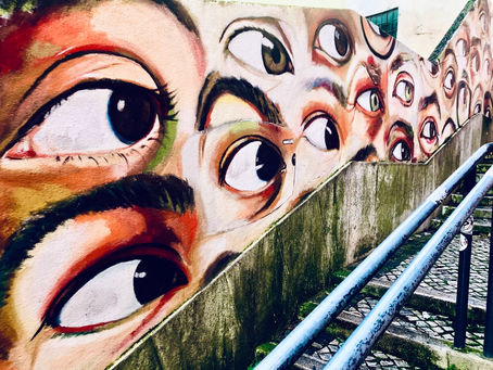 Painted eyeballs in an artistic mural, representing the brain's natural processing power during EMDR.