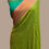 Thumbnail: olive green pure khaddi georgette handloom banarasi saree with hot pink border front view