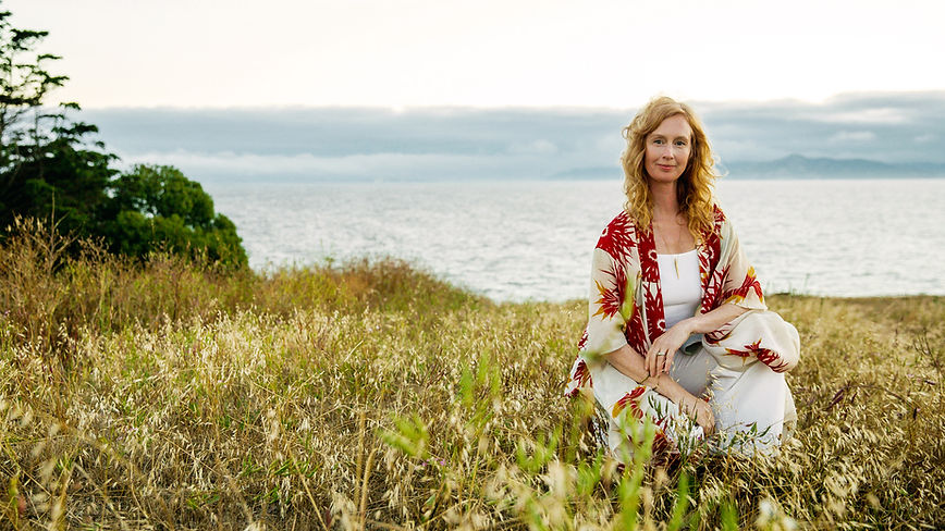 Marisa Belger, divorce and co-parenting coach for moms, smiling outdoors