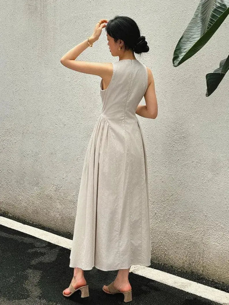 Thumbnail: White Sleeveless Maxi Dress with Mock Neck and Cut-Out Detail