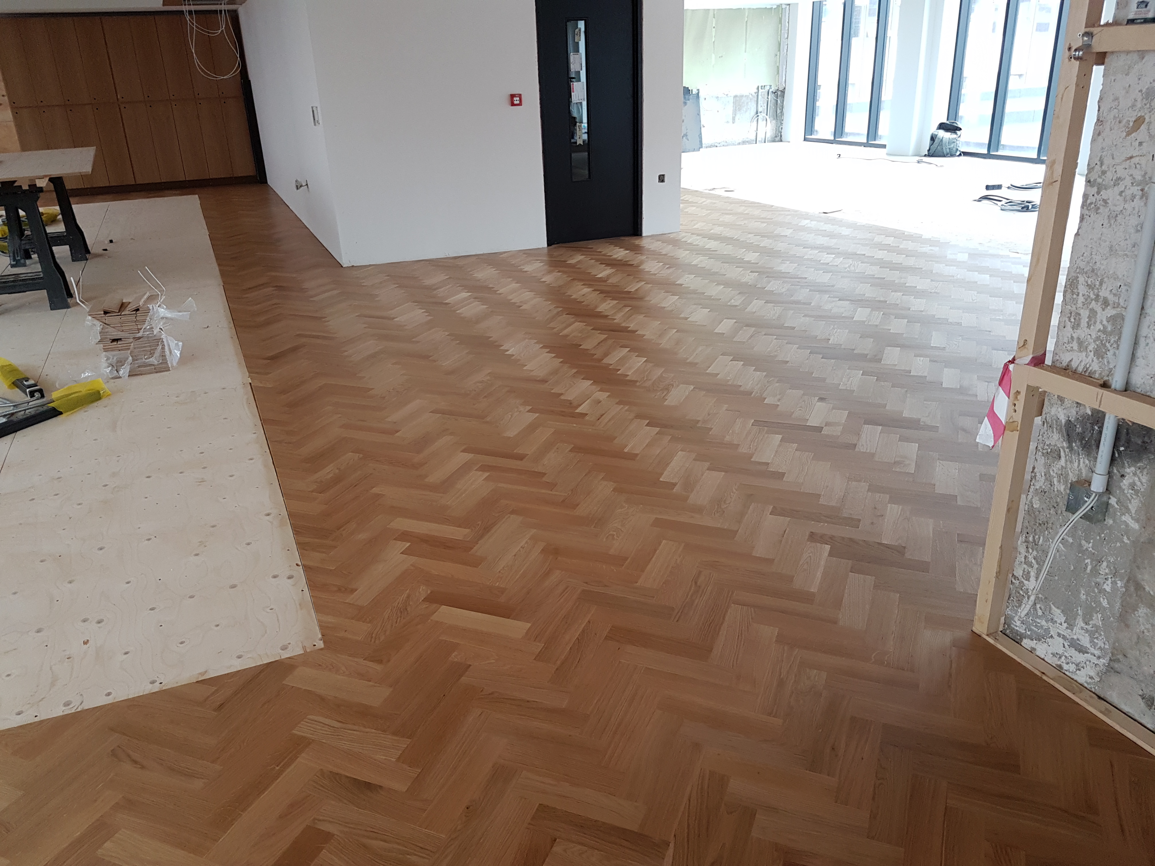Oak herringbone floor.