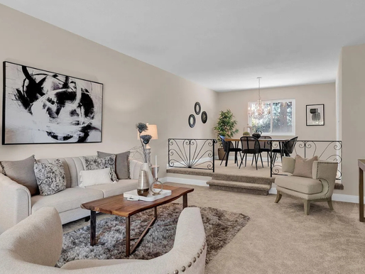 A living room and dining room are in an East Bay home staged by Elite Staging.