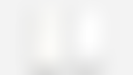 Two phones, one showing Perplexity and another showing ChatGPT.