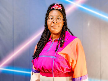 A 90s style headshot of Alexis, Community Manager of Galvanized Management in the Poconos.