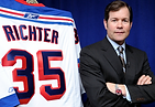 Mike Richter next to his NY Rangers Jersey
