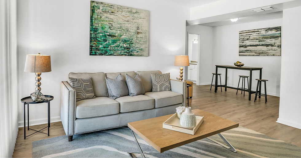 The living room in an apartment at WillowBrook Apartments in Pensacola, Florida.