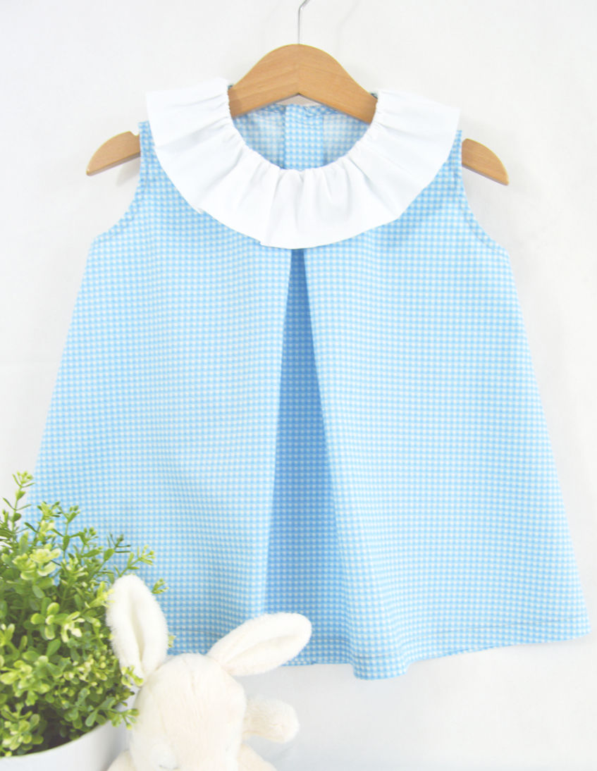 REF.1036 BLUSA PLISADA CUELLO VOLANTE