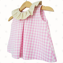 Blusa plisada cuello volante