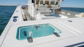 Crystal Bay fishing charter boat deck with livewell