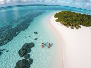 two people sitting on the shores of an excluded beach
