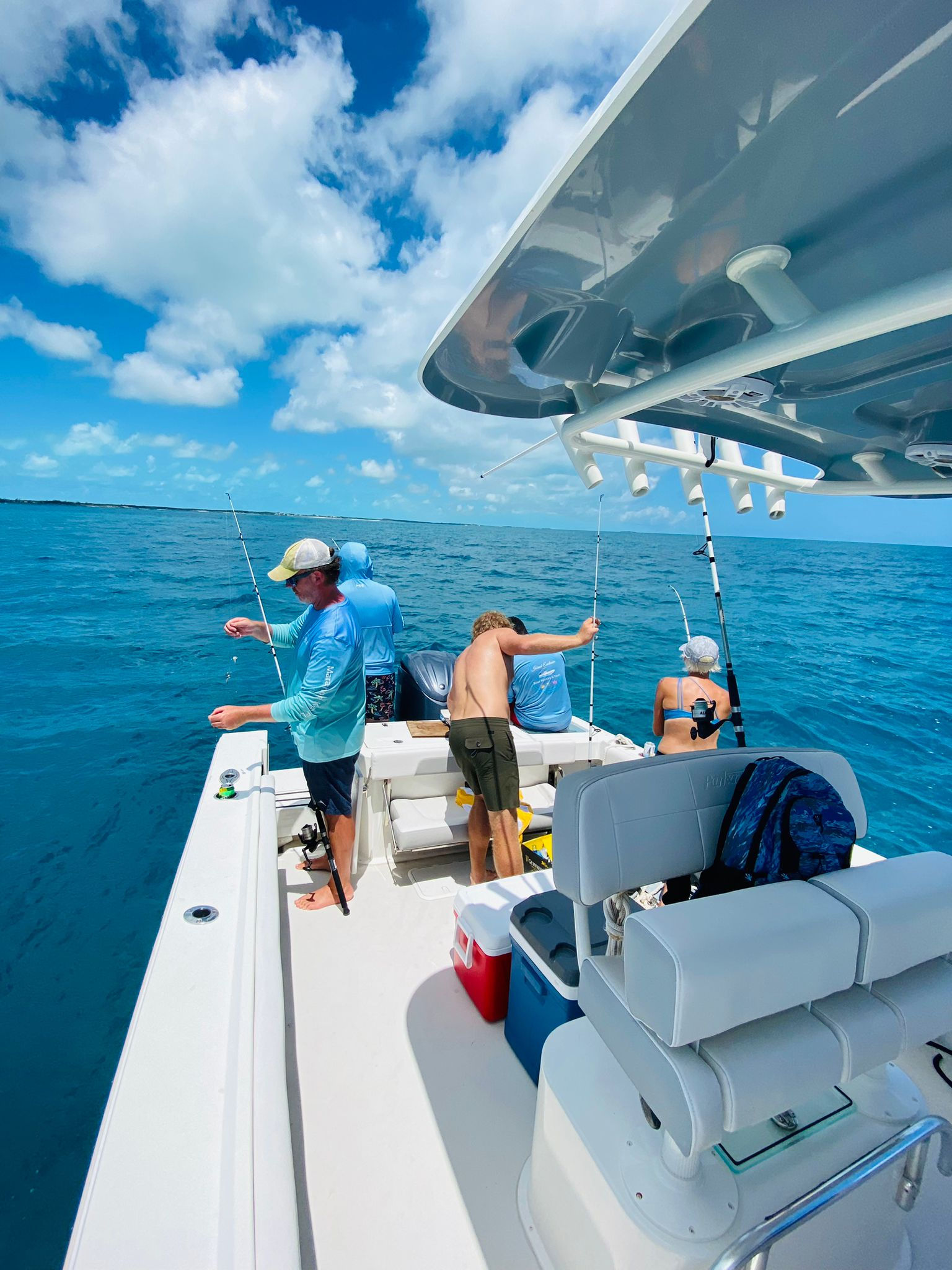 family having their full day fishing charter in exuma
