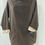 Thumbnail: Overstrand Dark Chocolate needle cord smock with a floral lining.