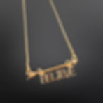 Up close view dream catcher with believe word and arrow motif necklace