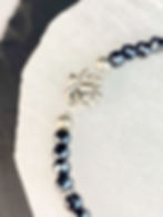 lotus hamsa bracelet close up