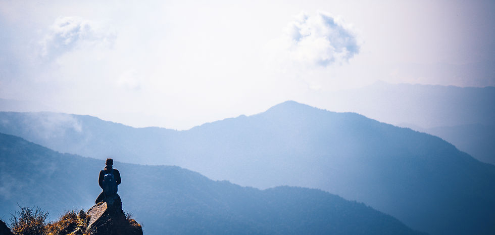 Medation alone on the clouds near Machapuchare Mardi Himal track in the Himalaya mountains