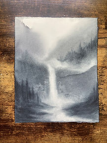 A misty waterfall scene. I mixed deep colors of red, green, and blue to achieve this monochromatic look. I started with wet paper and an abstract background and lifted the areas with water and mist. I added in the trees while the paper was still wet so the edges were soft and undefined. 