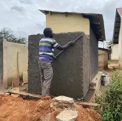 contractor working on the pit latrine