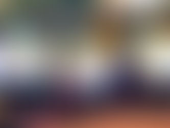 Never Stop Learning. Kids hold a sign at school