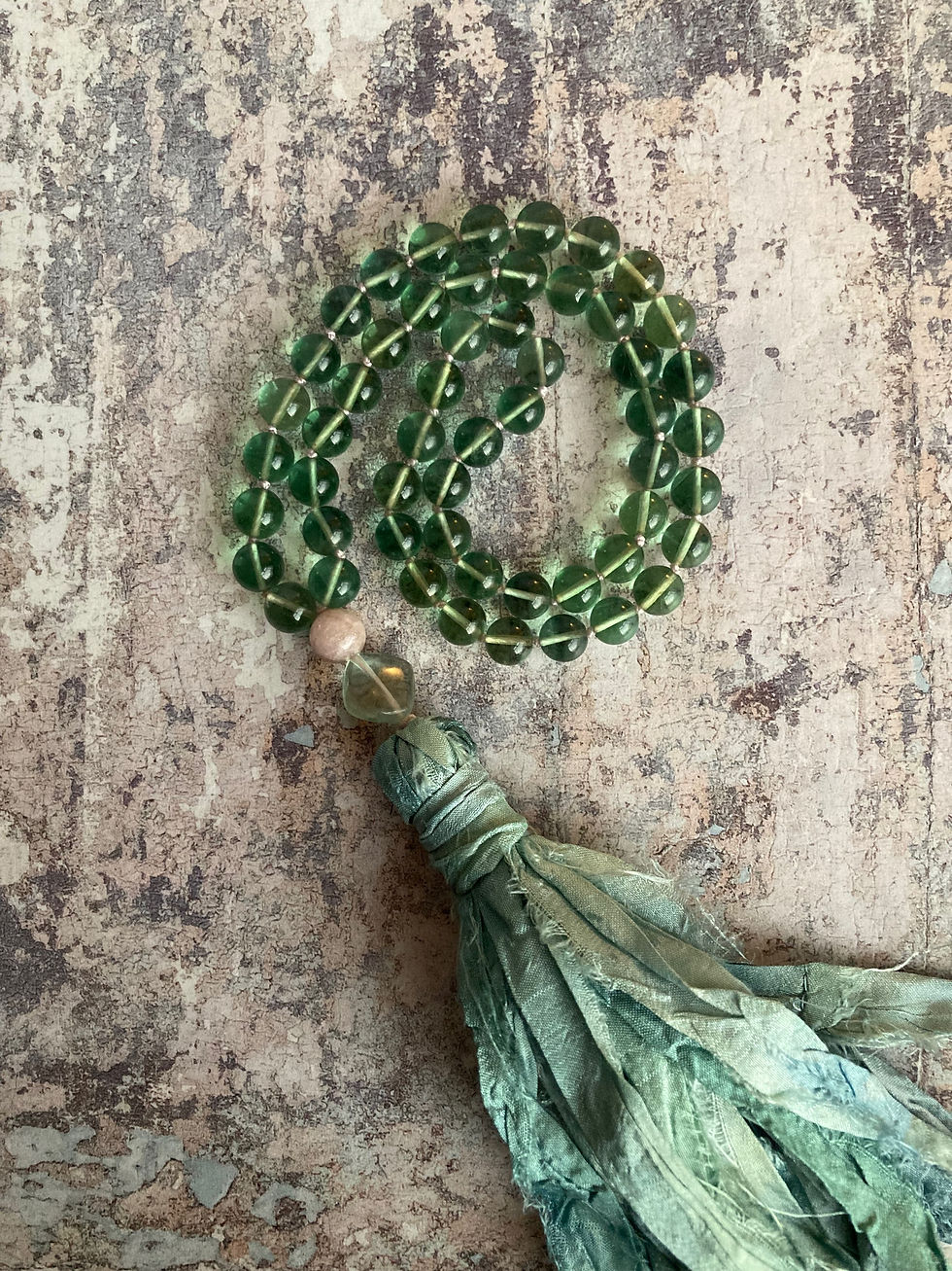 Thumbnail: A selection of ‘54 stone’ Sari-Silk meditation Malas 