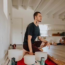 Instructor Dakota Dawkins during group sound bath healing session