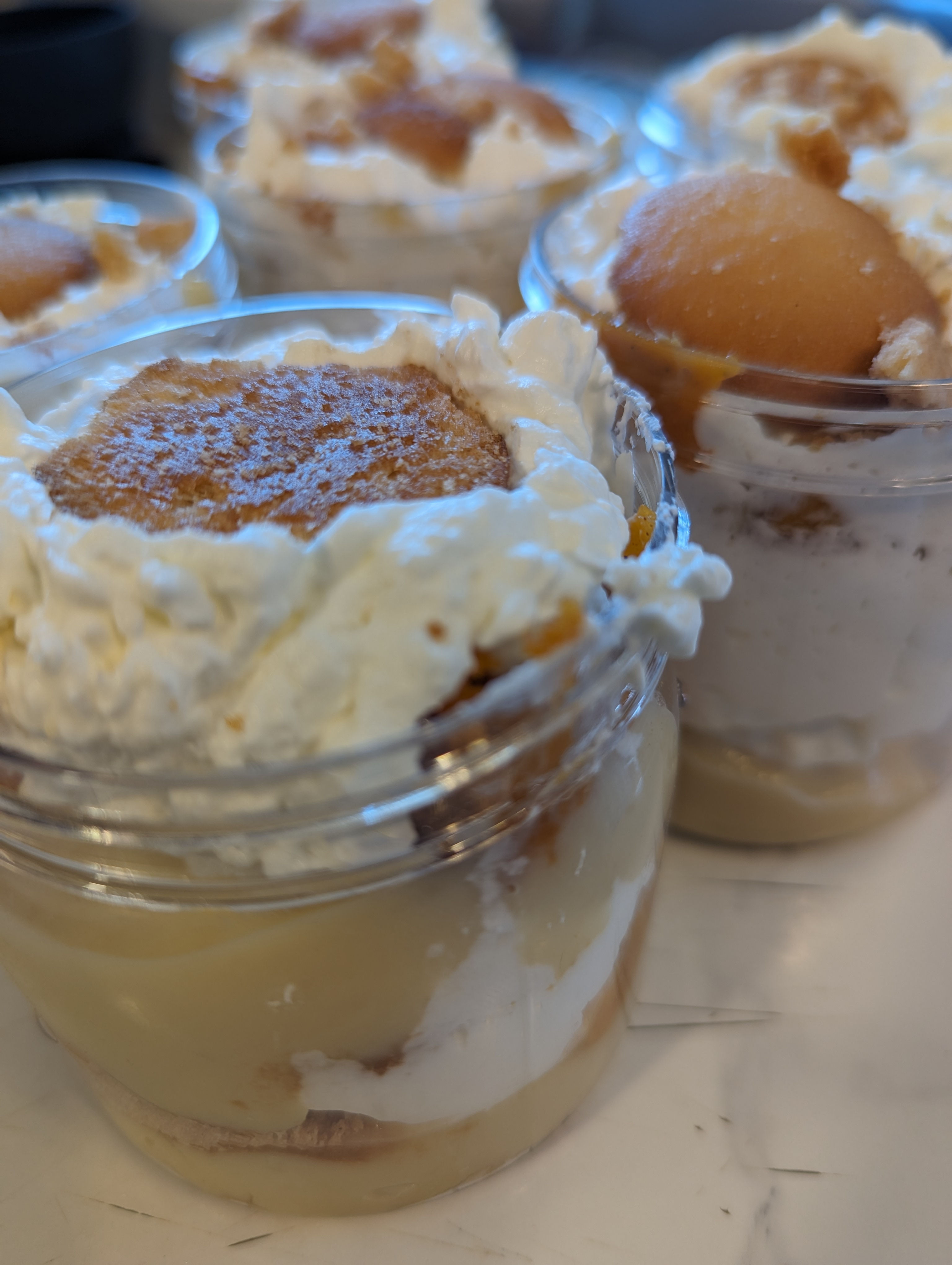 Banana pudding up close picture in a clear plastic jar