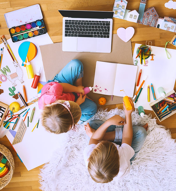 Kids drawing and making crafts with online art classes at home. Children using laptop to d