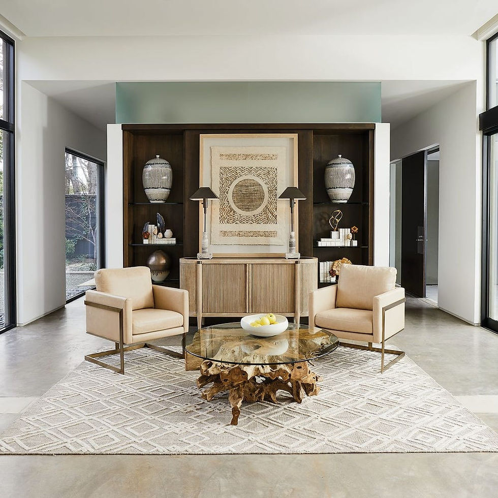 Two beige armchairs facing each other in a modern living room setting.