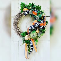 Wreath with ribbons, bow, and pumpkin decor; fall home design Inspirations Raleigh