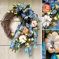Festive autumn wreath with pumpkins, blue bow, and decorative Inspirations Raleigh