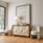 White chairs flanking the Swoosh 3 Door Cabinet under art in room.