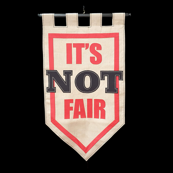 Linen banner with red border sayinh it's NOT fair
