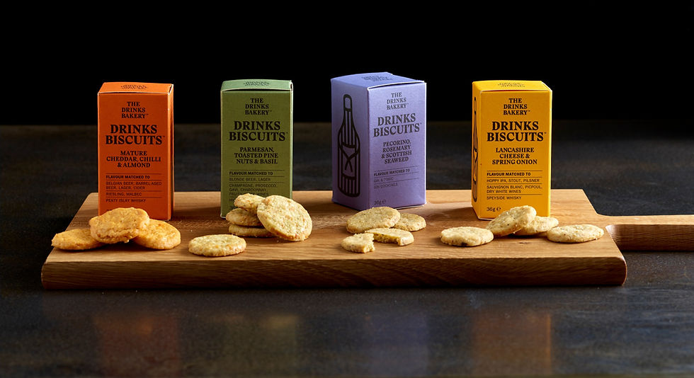 The four flavours of drinks Bakery Biscuits on a wooden board